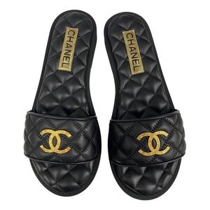 CHANEL Quilted Black and Gold Sandals